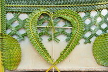 Weave Heart Shaped Coconut Leaves On Wall