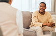 © Courtney/peopleimages.com - Black man, counseling and psychology consulting for therapy, mental healthcare or support. Happy patient talking to psychologist, therapist and medical help in consultation, advice and wellness check