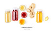 © ifiStudio - Fresh ginger shot bottles set isolated on white background.