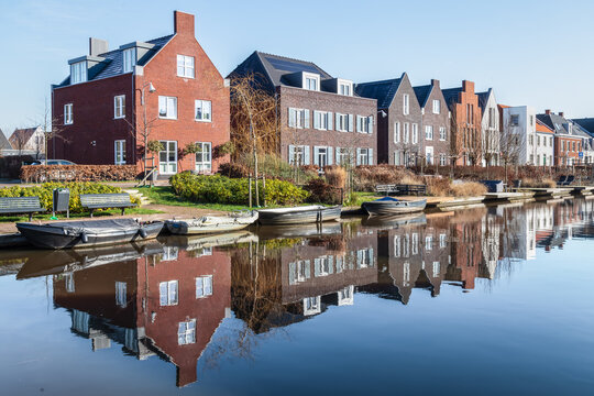 new modern residential buildings along the canal in the vathorst district in amersfoort.