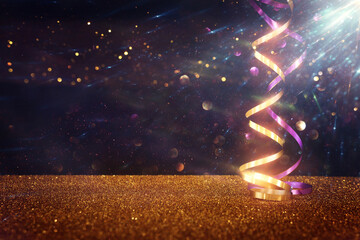 Wall Mural - Background image of glowing light and party or celebration ribbons