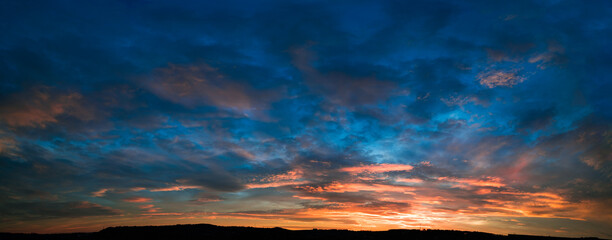 Canvas Print - cloudy sky panorama during summer sunset