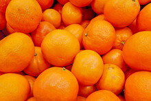 Stack Of Tangerines On A Market Stall