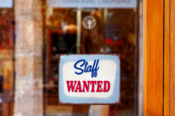 Wall Mural - Staff wanted sign in a store window