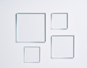 Glass square shapes on a light background.