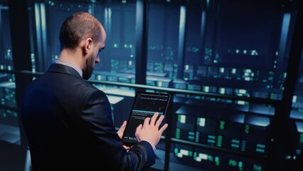 Poster - datacenter engineer using tablet in modern server room, planning cluster computer service or hosting
