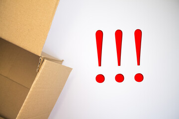 Poster - Exclamation mark word with cardboard box. Brown folded card box.