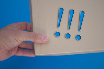 Poster - Exclamation mark word with cardboard box. Brown folded card box.