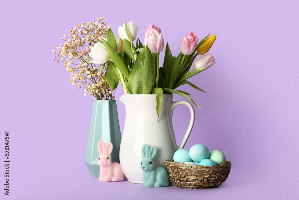 Vases with beautiful flowers, Easter eggs and bunnies on color background