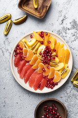 Wall Mural - Tropical fruit salad dessert, healthy vegan food, directly above