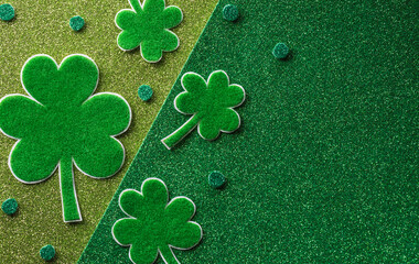 Wall Mural - Happy St Patrick's Day decoration concept made from shamrocks ( clover leaf) on green background.