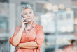 © Lumeez/peopleimages.com - Sad, phone call and senior business woman talking, chatting or speaking in workplace. Bokeh window, cellphone communication and ceo thinking, angry and bad news discussion on smartphone.