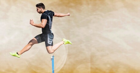 Wall Mural - Composition of male hurdle jumper with copy space on yellow background