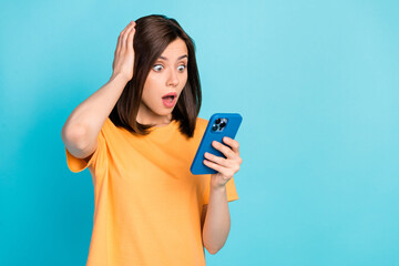 Sticker - Portrait of impressed speechless lady hand touch head open mouth stare telephone isolated on blue color background