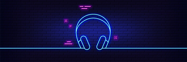 Poster - neon light glow effect. headphones line icon. music listening device sign. dj or audio symbol. 3d li