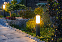 Outdoor Bollard Lamp In Residential Garden