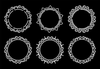 Fototapete - Set of round frames on a black background
