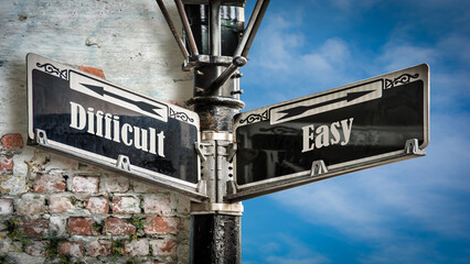 Wall Mural - Street Sign to Easy versus Difficult