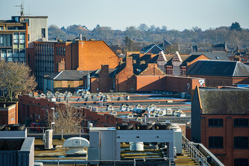 Aerial view over buildings and houses roofs in england uk