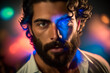 © Nando Vidal - Generative AI illustration of portrait of a man in a nightclub looking forward and color lights refelct in his face