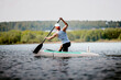 athlete canoeist rowing in lake. canoeing competition race