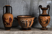 Three Ancient Greek Wine Vases Of Different Shapes With Meander Ornaments And Various Patterns Stand In A Row On A Wooden Shelf Against A Concrete Wall. 3d Render.