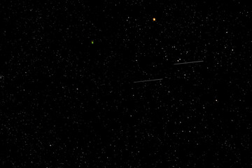 Wall Mural - Feb 14-15 2023 the rare green comet C/2022 E3(ZTF) made its closest pass by Aldebaran. The two share the night with twin meteors. 4 sec f/1.8 ISO 1600 Sony FE 135mm f/1.8 GM Sony a7R IVA
