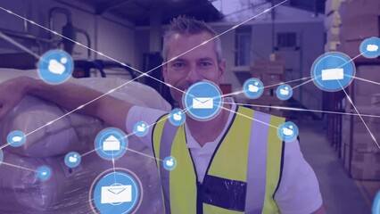 Poster - Animation of network of digital icons against caucasian male worker smiling at warehouse