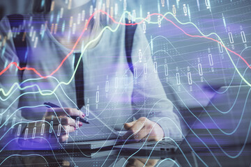 Aufkleber - Double exposure of businesswoman hands typing on computer and financial graph hologram drawing. Stock market analysis concept.