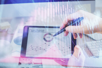 Poster - Double exposure of man's hands holding and using a phone and financial chart drawing. Market analysis concept.