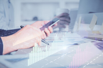 Aufkleber - Double exposure of man's hands holding and using a phone and financial chart drawing. Market analysis concept.