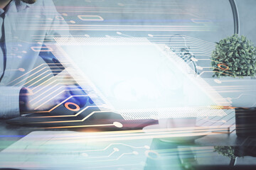 Poster - Multi exposure of man's hands holding and using a digital device and data theme drawing. Innovation concept.