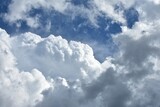 Fototapeta Niebo - Cumulus clouds in a blue sky.