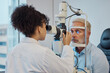 © Coetzee/peopleimages.com - Vision, eye exam and healthcare with a doctor woman or optometrist testing the eyes of a man patient in a clinic. Hospital, medical or consulting with a female eyesight specialist and senior male
