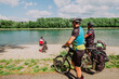 © Cavan Images - A Group of cyclists have fun in the Rin river, Germany