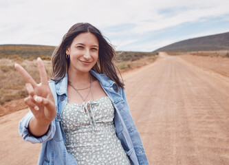 Canvas Print - Travel, portrait and woman on safari with peace sign, outdoor on adventure in Kenya, holiday and summer road trip. Mockup space, happy and journey with freedom, lifestyle and fun in nature with hand