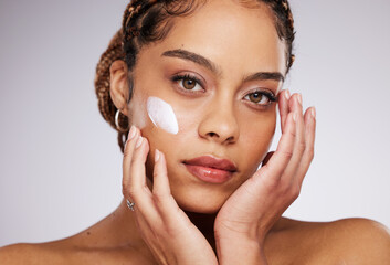 Wall Mural - Black woman, face lotion and portrait of a young model with facial mask, moisturizer and wellness. Studio, beauty and female with dermatology, collagen and cosmetic cream for skin glow and self care