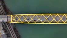 Top Down Aerial View Of Cars Traveling On Fort Pitt Bridge In Pittsburgh. Iconic, Famous Yellow Bridges In Pittsburgh PA.