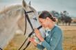 .Happy, horse and hug with woman in countryside for adventure, race and embrace. Relax, smile and equestrian with girl jockey and pet and affection on ranch for travel, therapy and animal care.