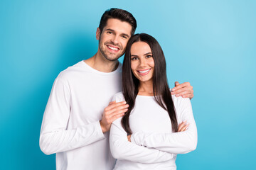 Sticker - Photo portrait of attractive young male female cuddle hug cheerful marriage wear trendy white clothes isolated on blue color background