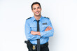 © luismolinero - Young police caucasian man isolated on white background keeping the arms crossed in frontal position