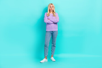 Poster - Full body portrait of calm focused pretty lady folded hands posing isolated on turquoise color background