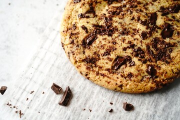 Poster - Homemade giant single serve chewy chocolate chip cookie, selective focus