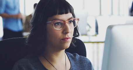 Aufkleber - Computer, serious and business woman working in an office at a startup company planning in an agency using internet. Employee, worker or female journalist brainstorming a story at her workplace