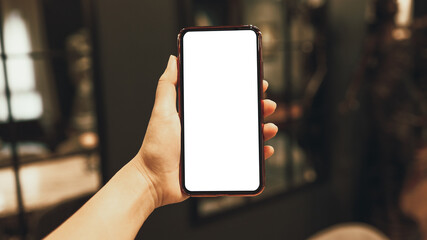 Women's hands holding cell telephone blank copy space screen. smartphone with blank white screen isolated on white background . smart phone with technology concept