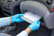 © wellphoto - Replacing cabin pollen air filter for a car