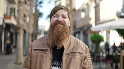 Poster - Young redhead man smiling confident standing at coffee shop terrace