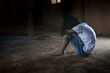 © AungMyo - Sad child girl sitting alone with sad feeling at old room. Human trafficking