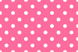 White polka dot on pink background. seamless white polka dot pattern on pink background