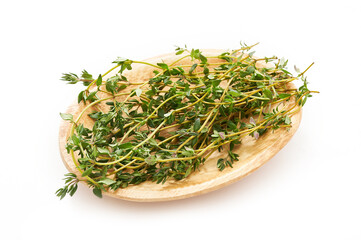 Wall Mural - thyme leaves in wood bowl isolated on white background. heap of green thyme leaves isolated on white background. fresh thyme leaves isolated on white background                      